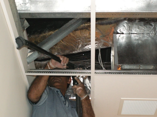 Data centre ceiling void cleaning wrenching